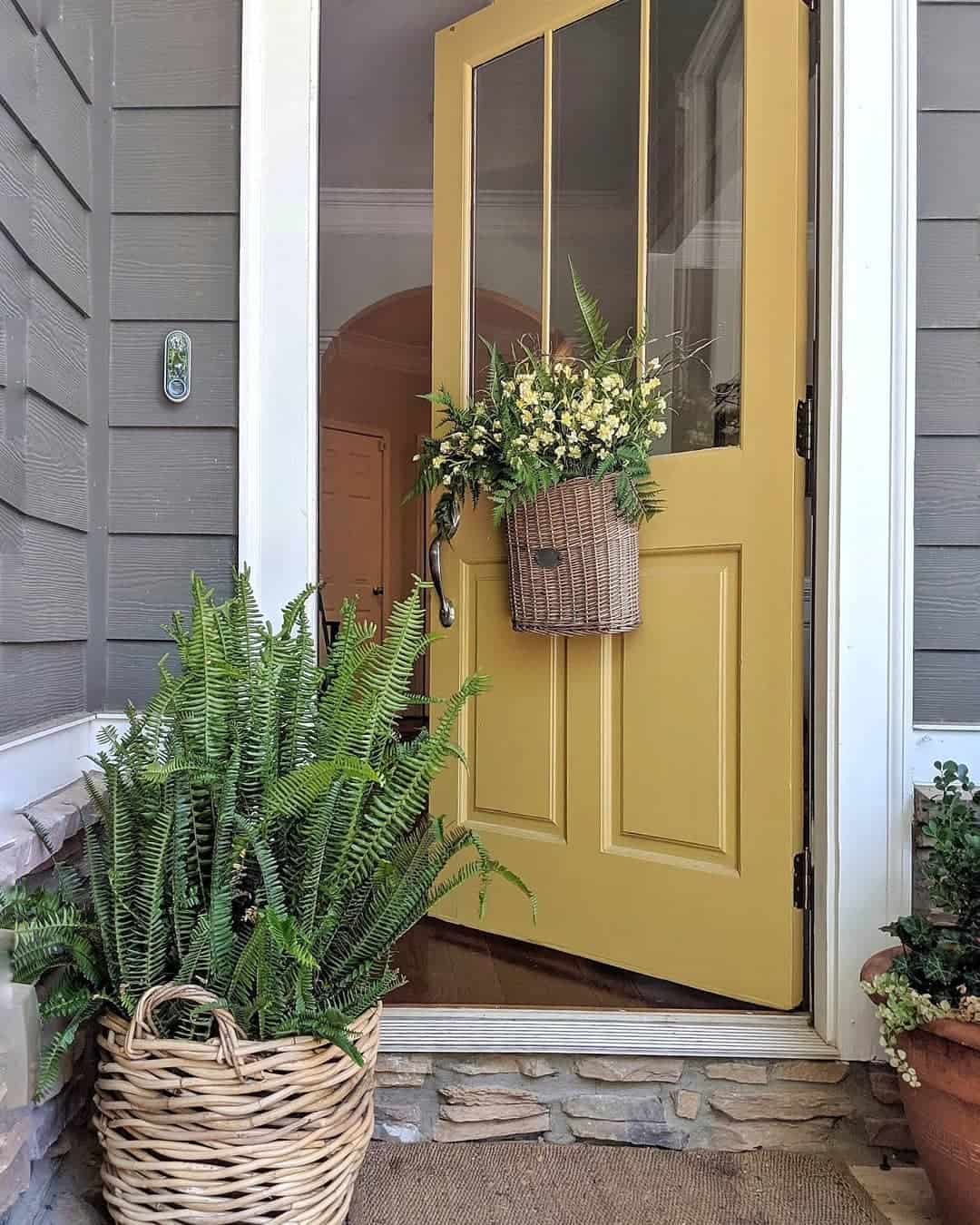 https://www.soulandlane.com/wp-content/uploads/2022/08/Front-Door-with-Basket-of-Green-Leaves-and-Yellow-Flowers.jpg