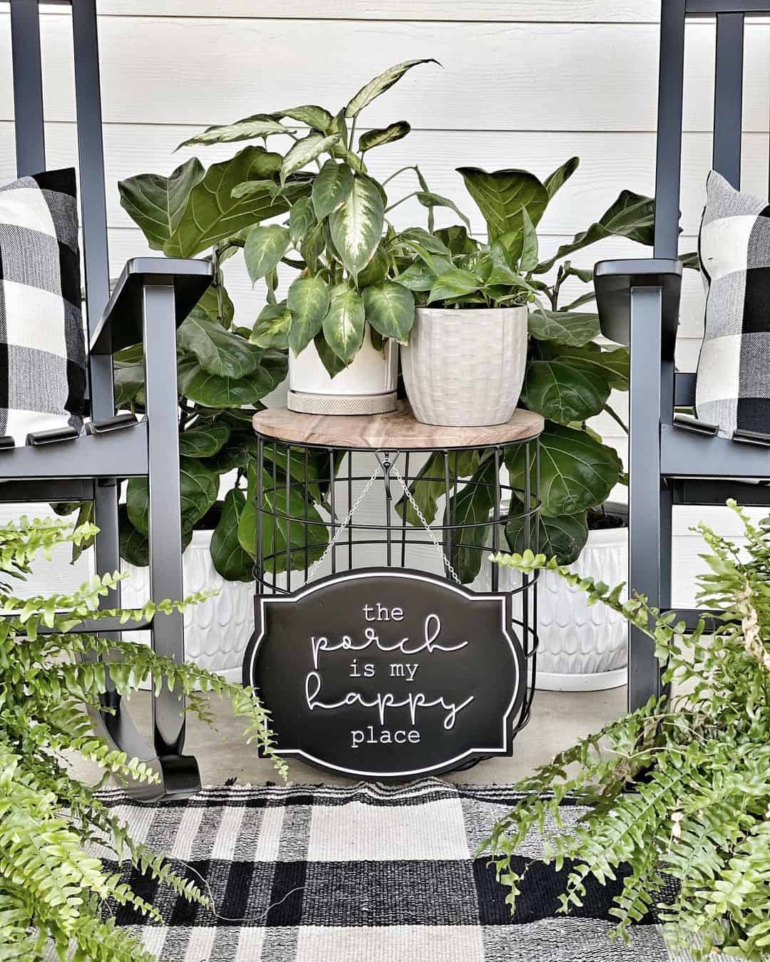 Porch With Greenery Decor In White Planters 