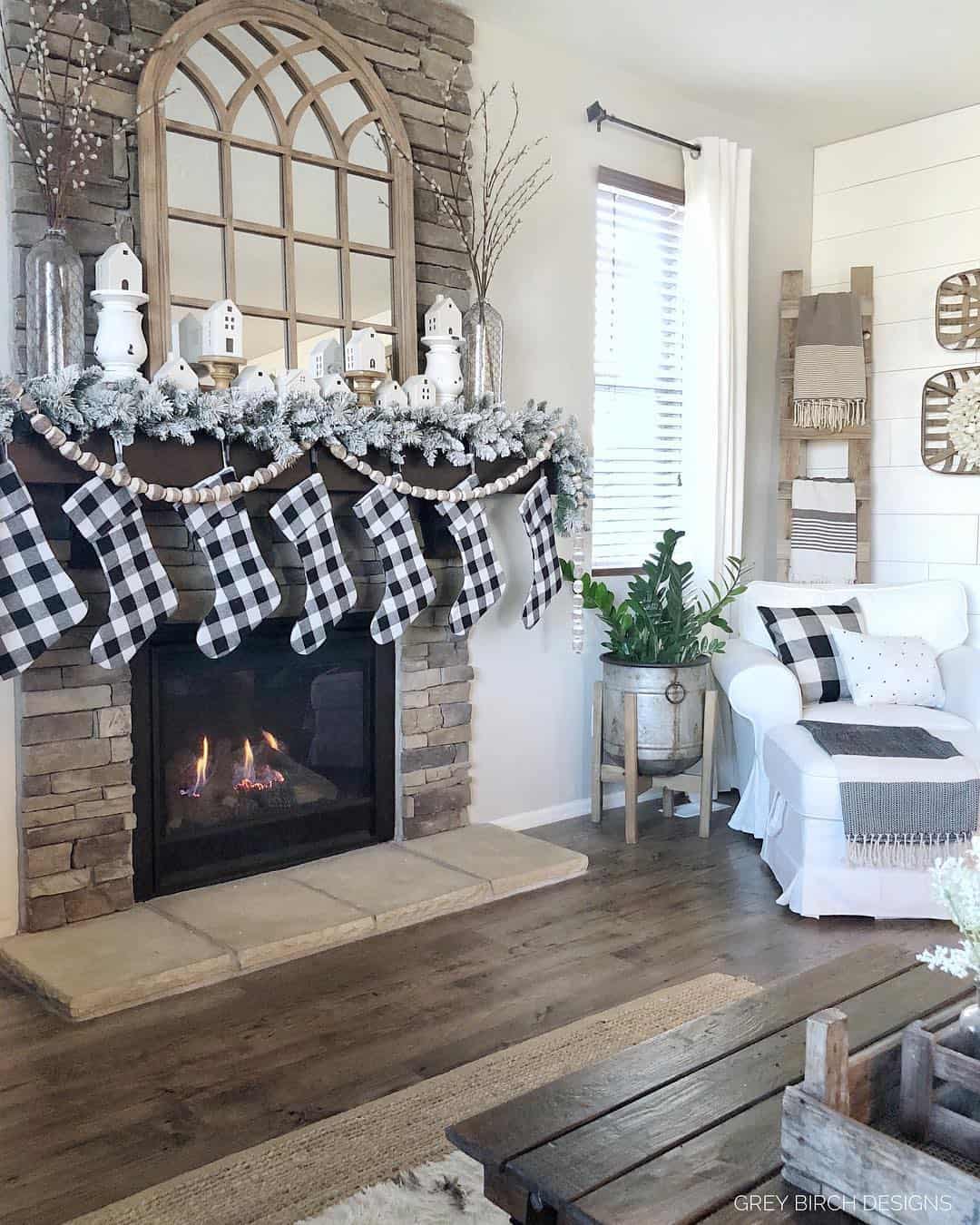 Stone Fireplace Living Room with Plaid Décor - Soul & Lane