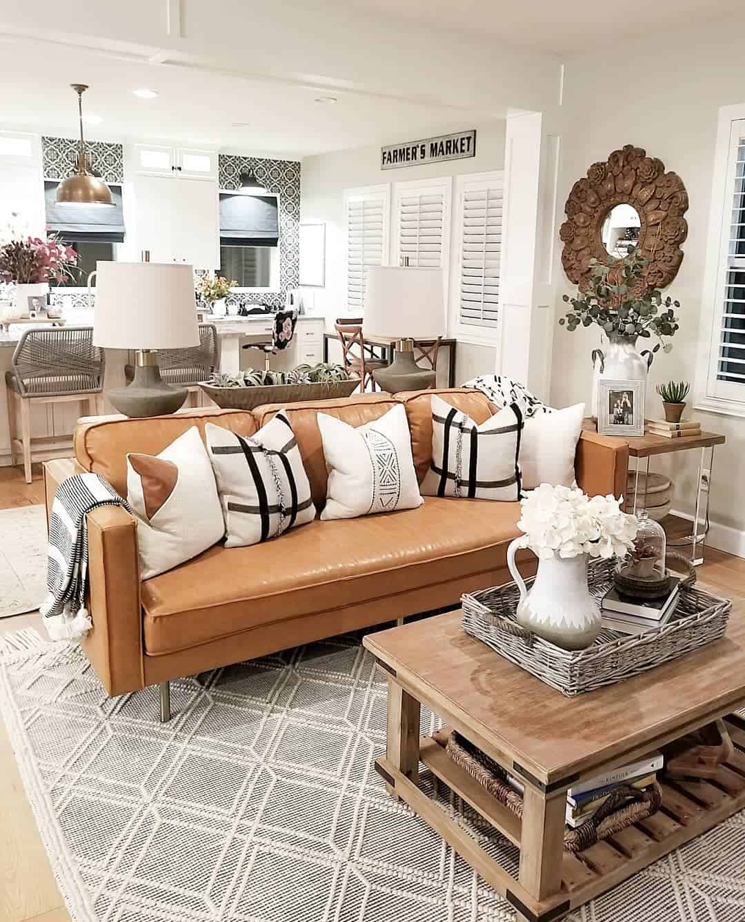 https://www.soulandlane.com/wp-content/uploads/2022/08/White-and-Black-Throw-Pillows-With-a-Modern-Brown-Leather-Couch.jpg