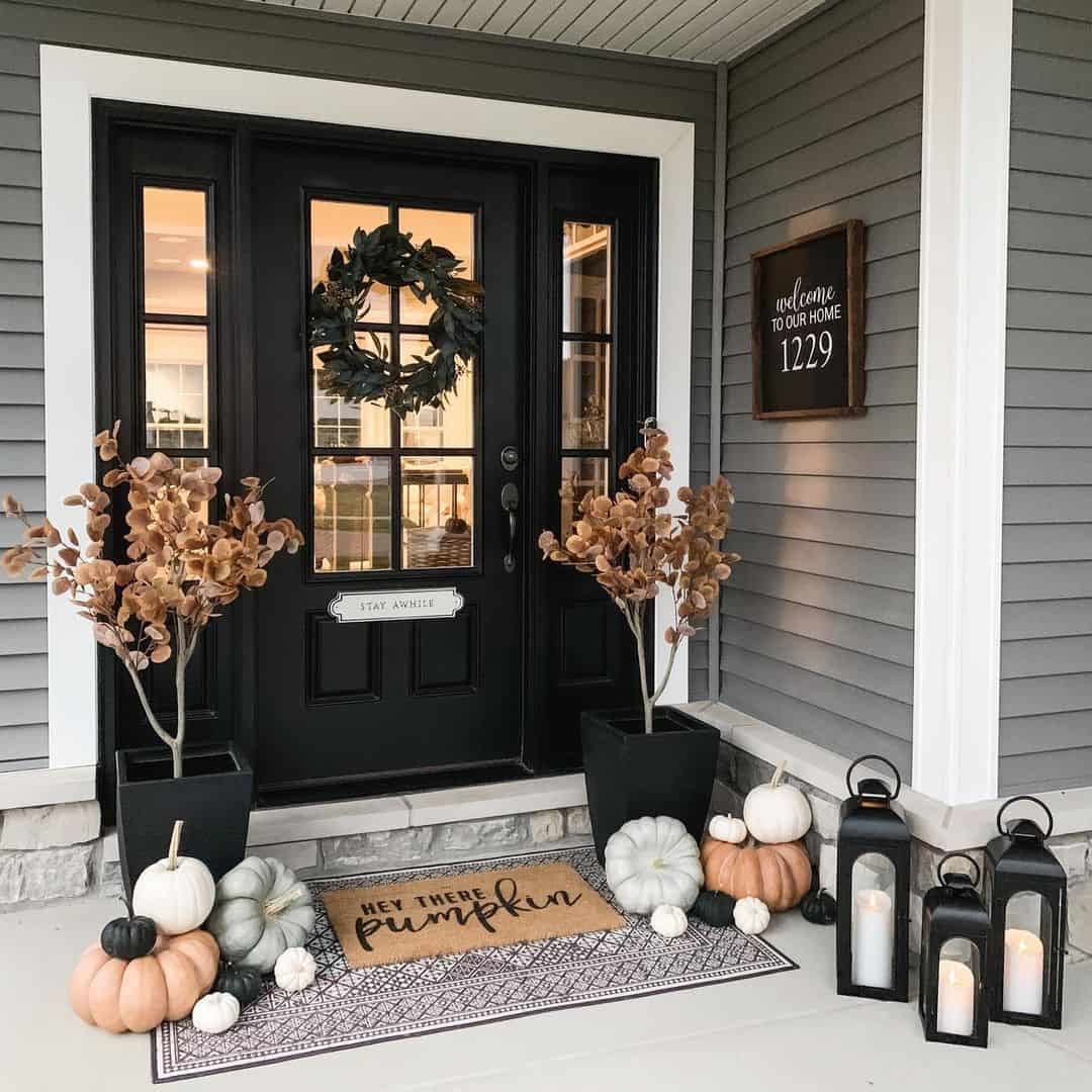 Gray Home With Black Front Door and Matching Sidelights - Soul & Lane