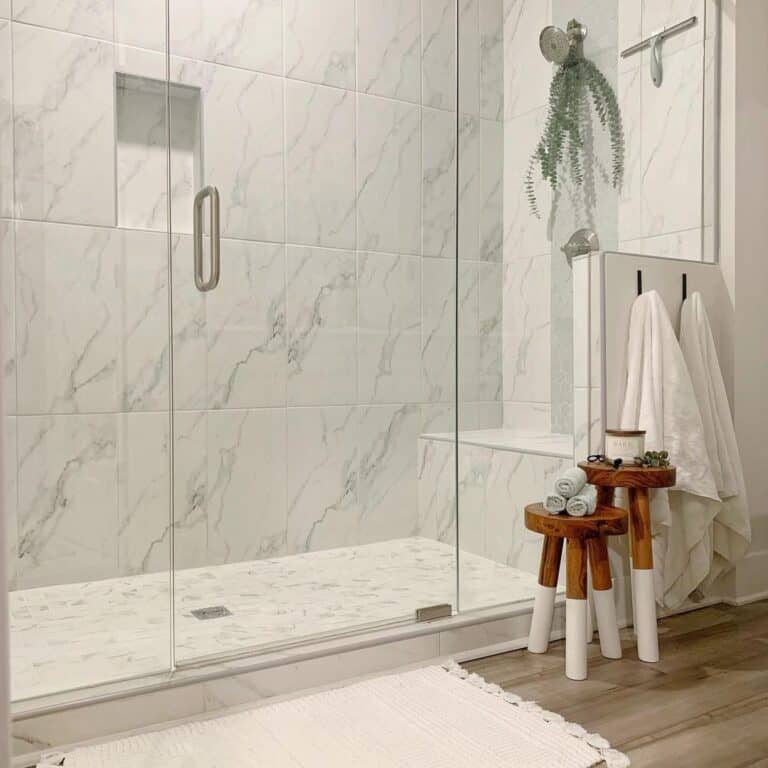Two Stools Outside Large White Tiles On Shower Walls 768x768 