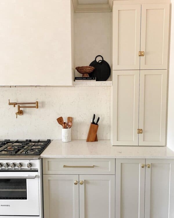 Cream Beige Kitchen Cabinets With Gold Hardware 600x750 