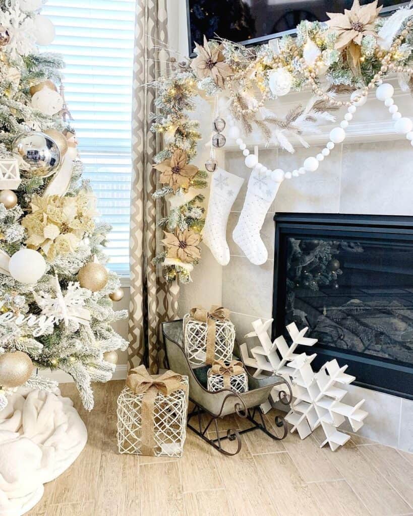 Fireplace with White Wood Snowflake Decorations - Soul & Lane