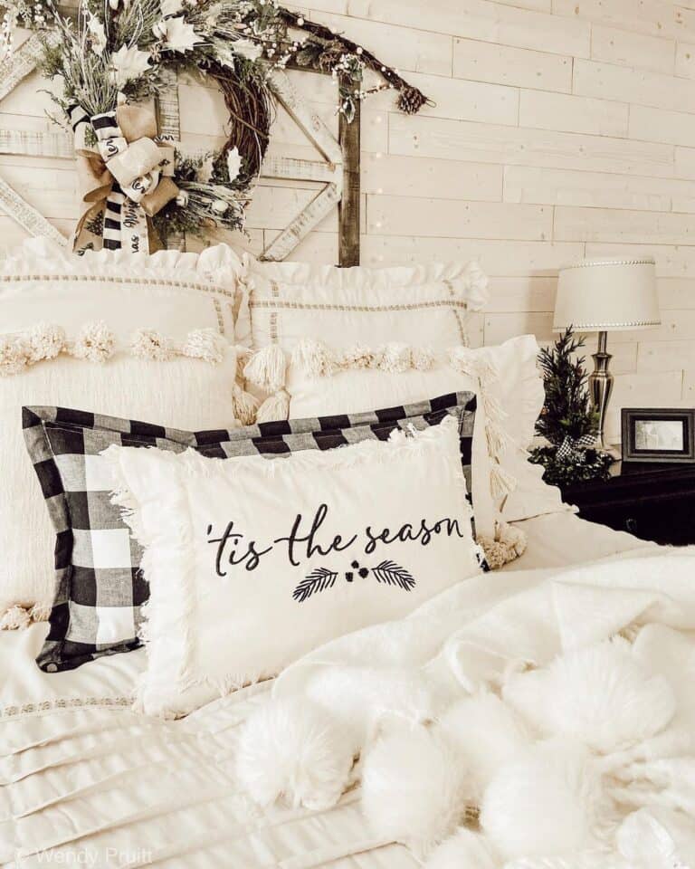https://www.soulandlane.com/wp-content/uploads/2022/10/Rustic-Bedroom-with-Black-and-White-Accent-Pillow-768x960.jpg