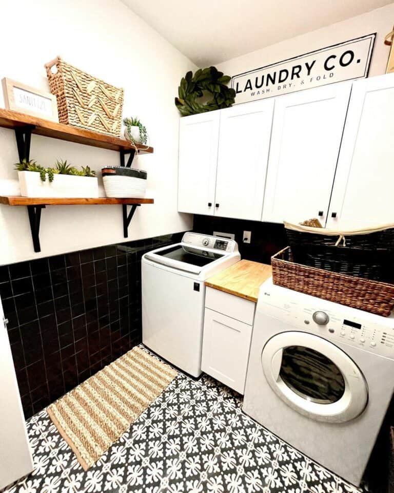 https://www.soulandlane.com/wp-content/uploads/2022/12/Black-Tile-on-Laundry-Room-Walls-768x960.jpg