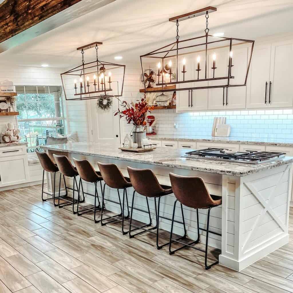 Modern White Kitchen with Chandeliers and Island