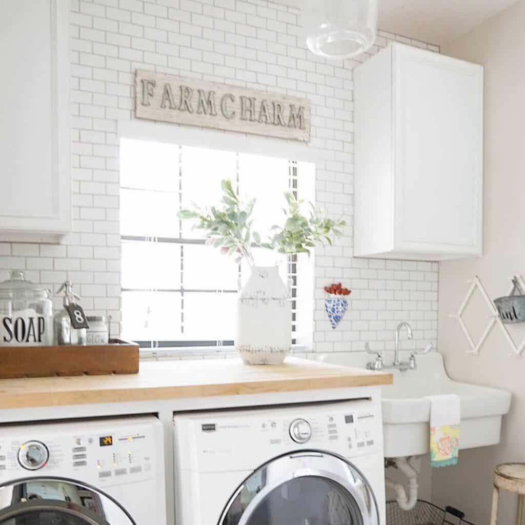 Small Laundry Room with Wall-Mounted Sink