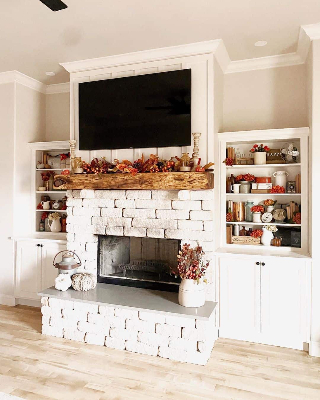 Stone Fireplace With Built Ins On Each Side 