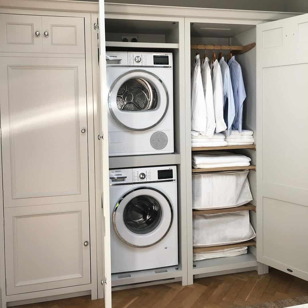 https://www.soulandlane.com/wp-content/uploads/2023/01/Stackable-Laundry-Room-Ideas-with-Beige-Cabinetry.jpg