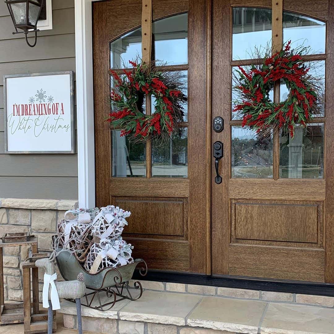 Wooden Double Doors With Red Berry Wreaths - Soul & Lane