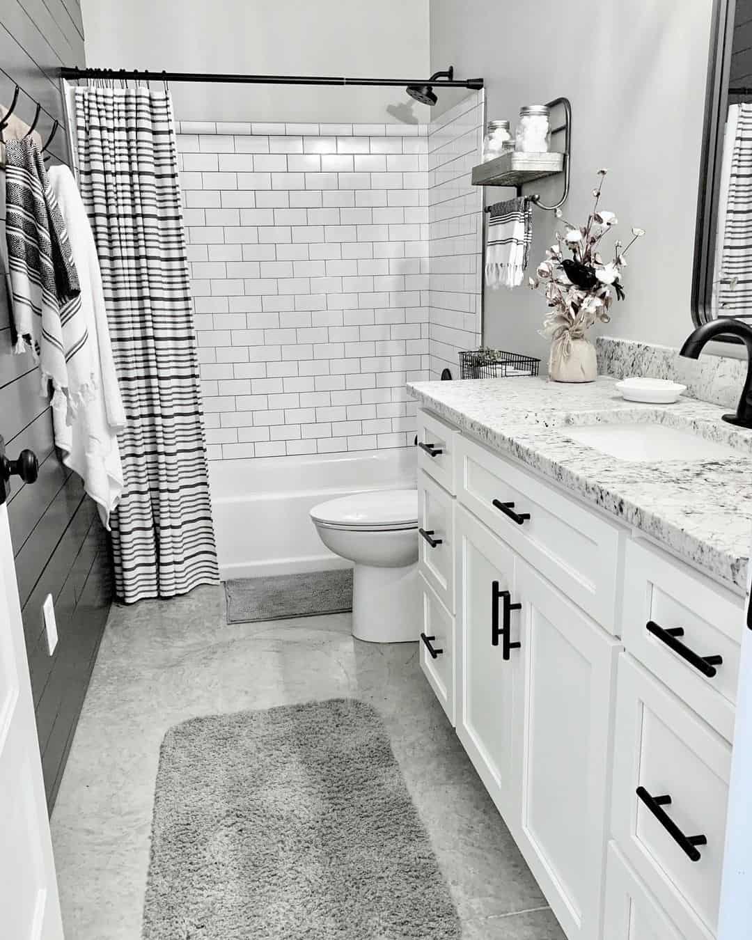 Black, Gray, and White Bathroom With Marble Counter - Soul & Lane