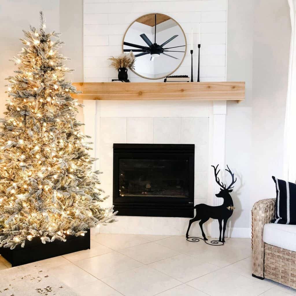 Light Gray Square Tile Fireplace With Black Reindeer Décor - Soul & Lane