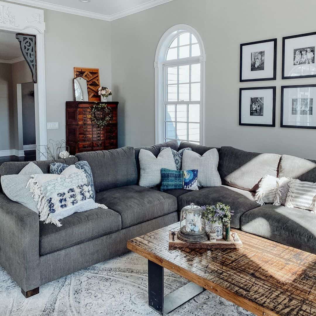 Living Room With A L Shaped Dark Grey Couch 