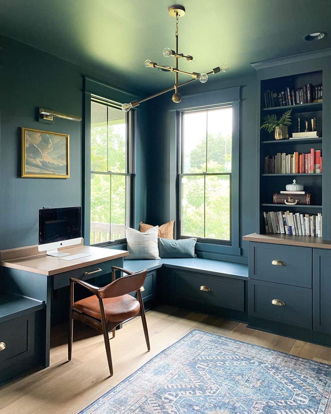 https://www.soulandlane.com/wp-content/uploads/2023/02/Masculine-Rich-Blue-Home-Office-Inspiration.jpg