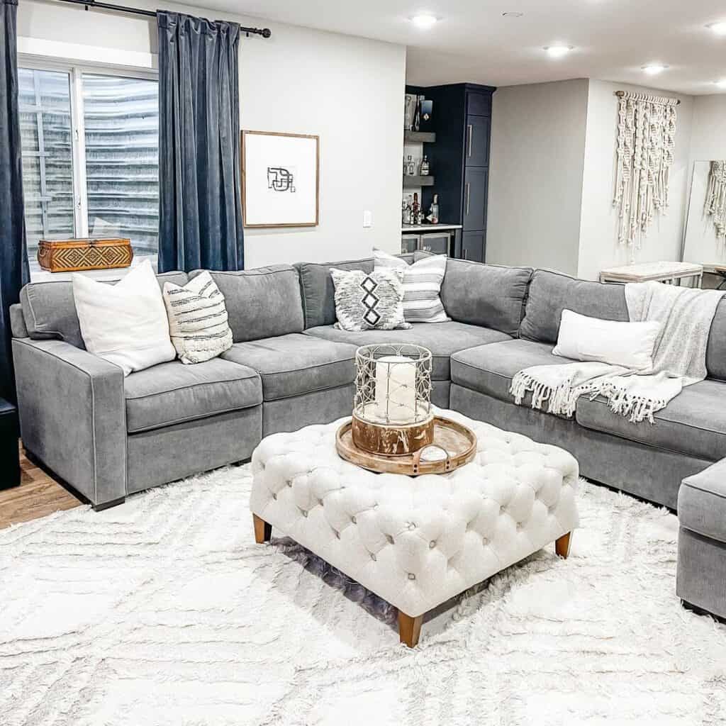 Basement Living Room With Gray Sofa - Soul & Lane