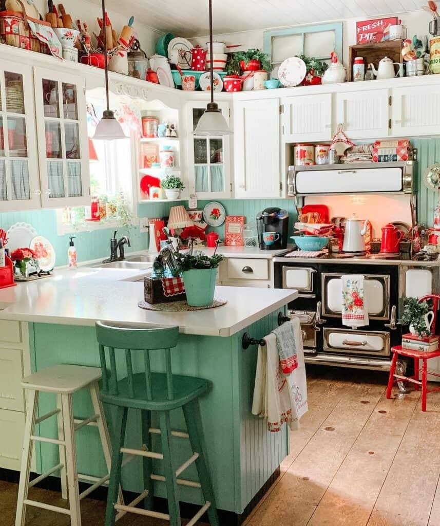 https://www.soulandlane.com/wp-content/uploads/2023/03/Kitchen-With-Red-and-Mint-Green-Kitchen-Decor-857x1024.jpg