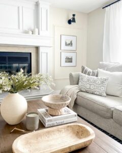 Living Room With White Fireplace and Beige Walls - Soul & Lane