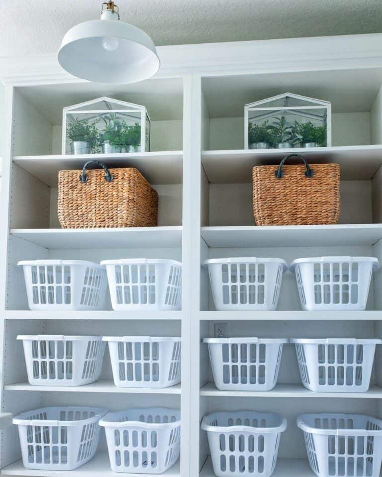 White Open Shelves With White Plastic Laundry Bins - Soul & Lane