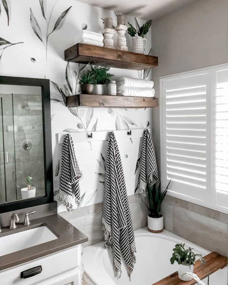 https://www.soulandlane.com/wp-content/uploads/2023/05/White-and-Black-Metal-Bathroom-Towel-Rack-768x960.jpg
