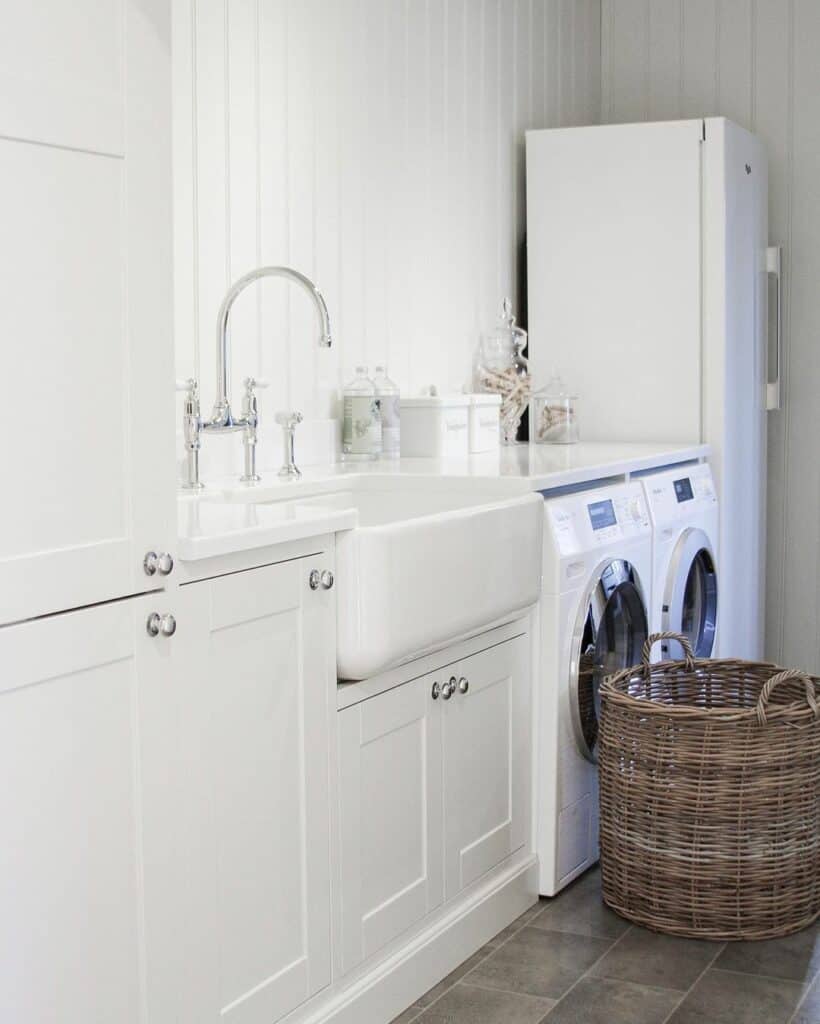 All White Laundry Room With Apron Sink 820x1024 